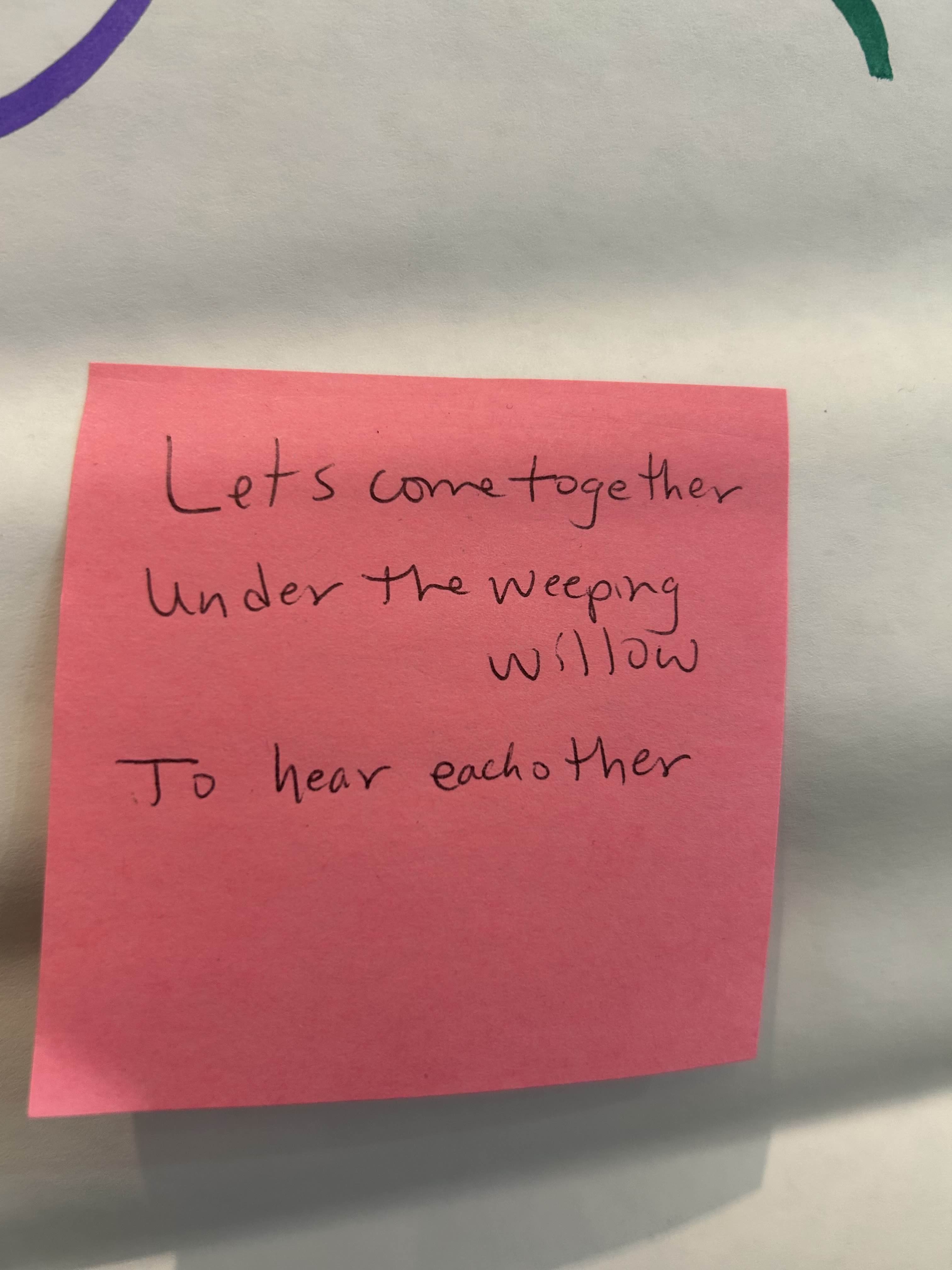 A handwritten haiku on a sticky note